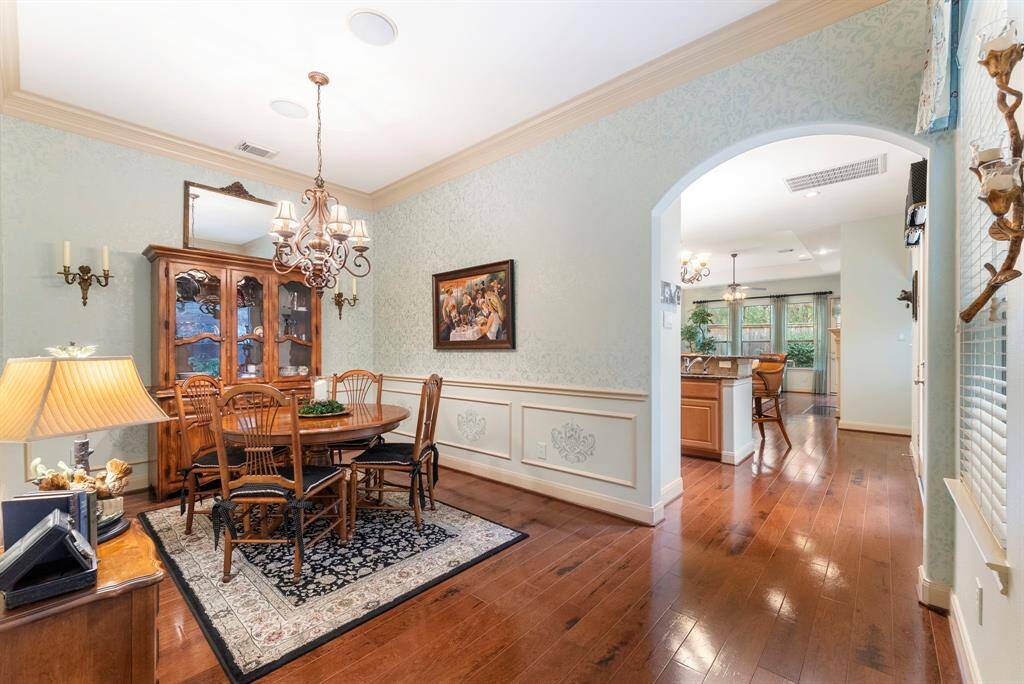 The formal dining room sits right next to the kitchen.