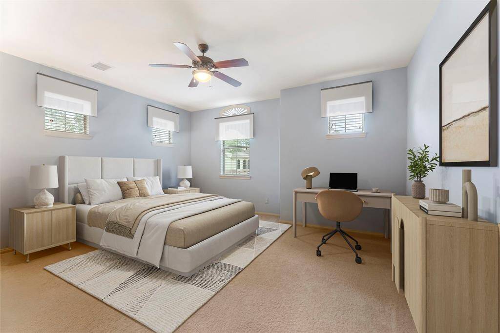 Secondary bedroom/guest suite on the second floor. (Virtually staged)
