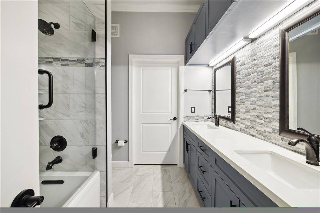 Very the baths have been remodeled! Check out the cabinets over the mirrors! Great storage!