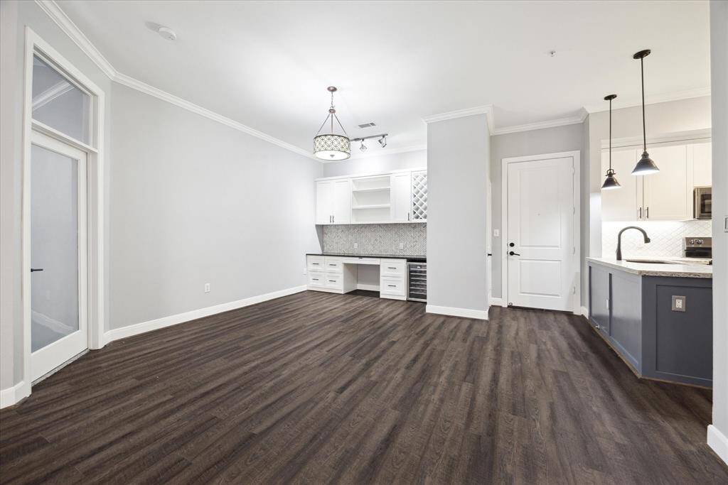 Built ins (with beverage refrig) in the dining area can also double as a home office.