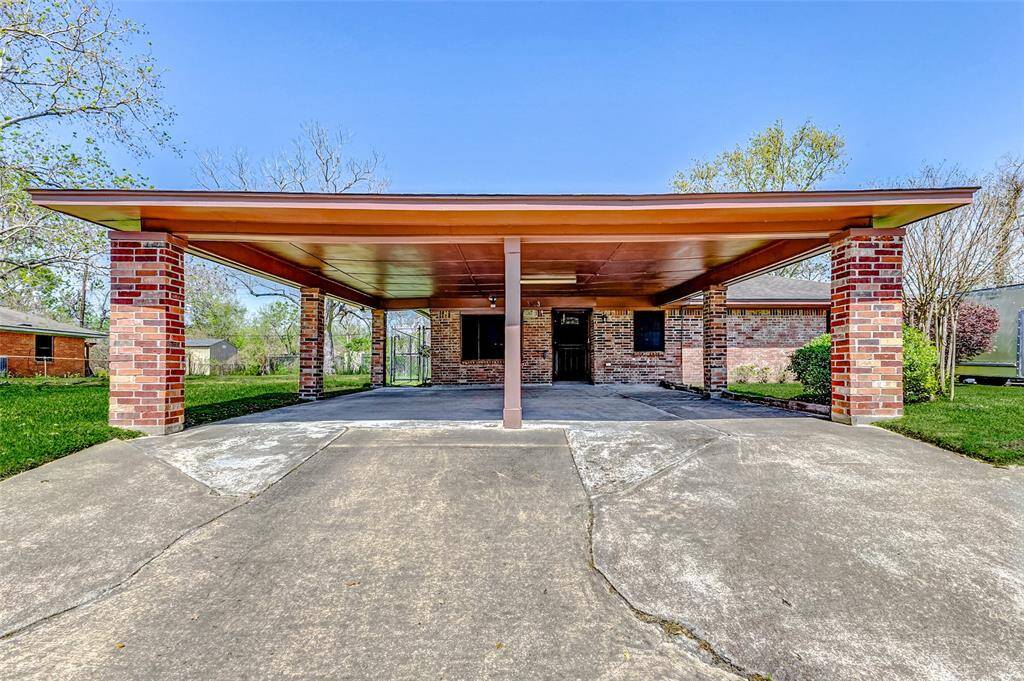Beautiful Brick home with Covered Parking and extra long Driveway