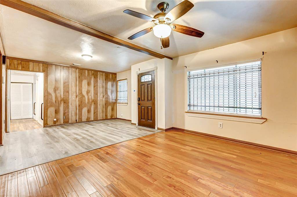View of Dining Room looking into Living Room and down the hall to the bedrooms