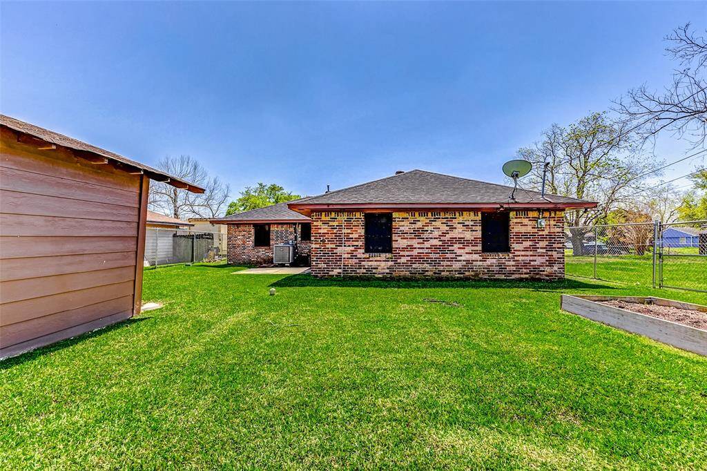 View of back of Home with extra large backyard, plenty of room for all the games you like to play