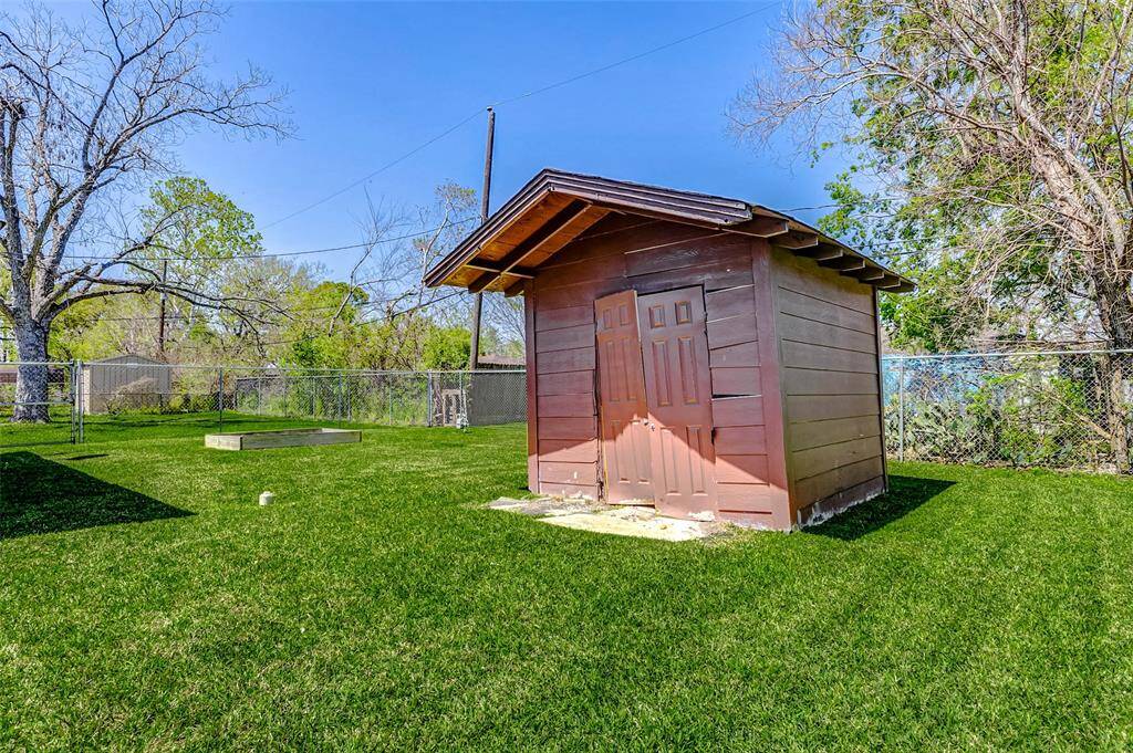 Storage house for lawn care items and addition storage
