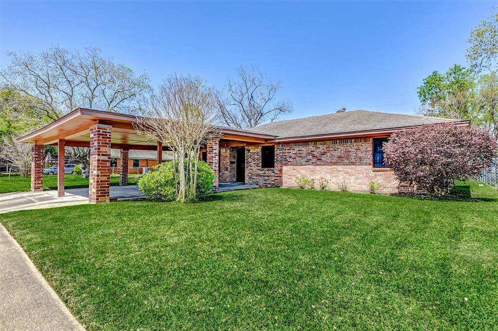 Well kept home with beautiful mature landscaping