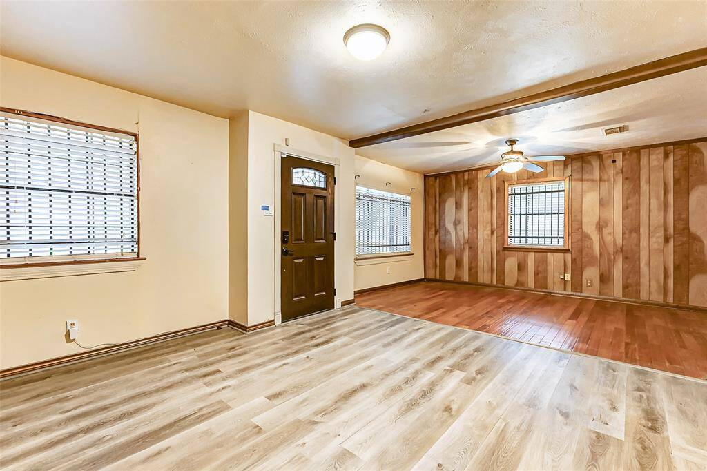 View of the front entry with oversized Living Room and dining room