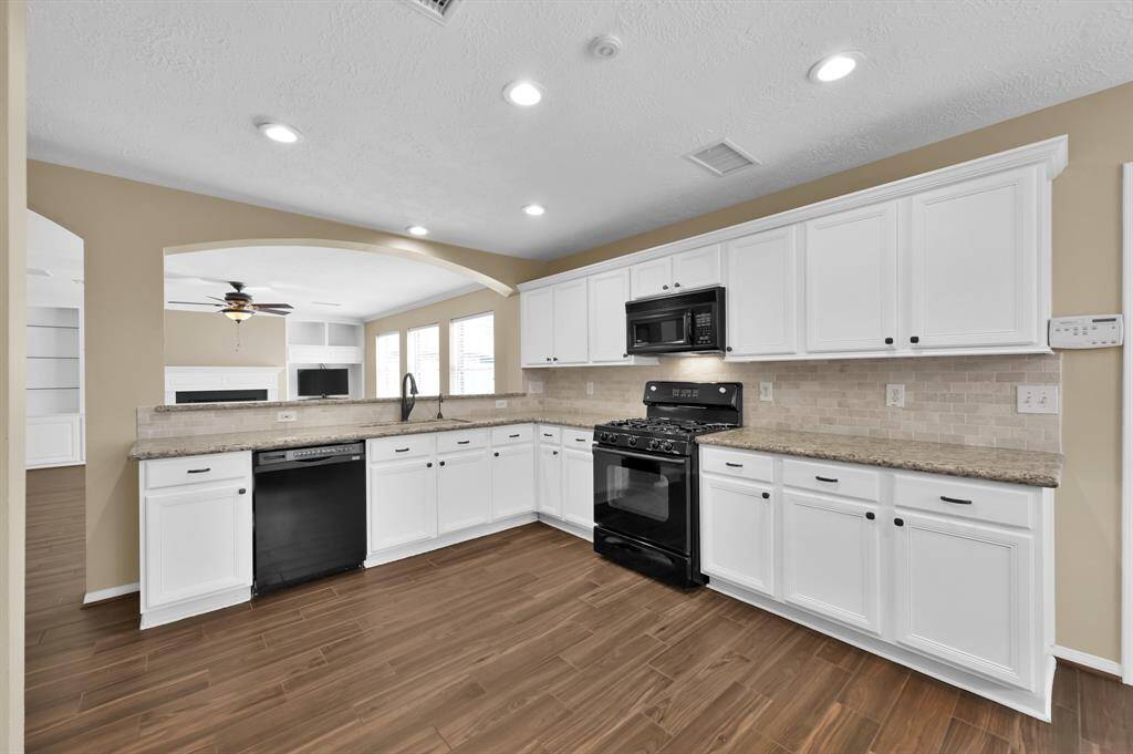 KITCHEN OPEN TO LIVING ROOM