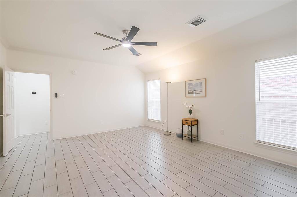 The door to the left opens up to the back patio.