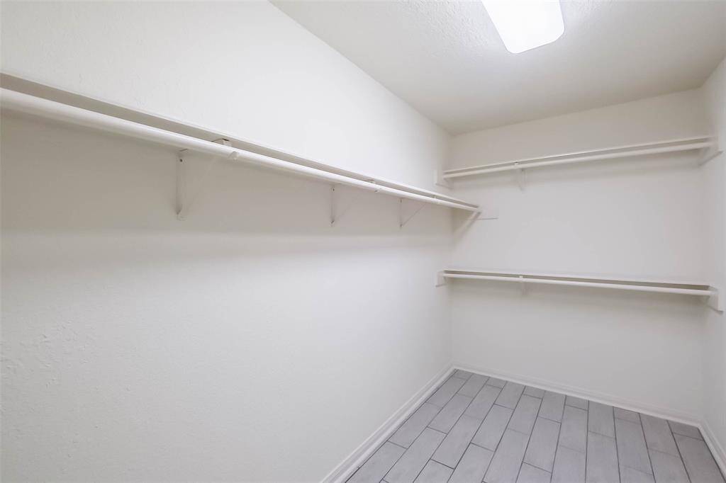 View of both vanities. Private toilet room (not in view) has a new toilet.