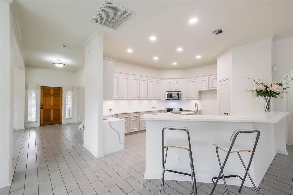 Primary suite also has a large 12' X 6' walk in closet.