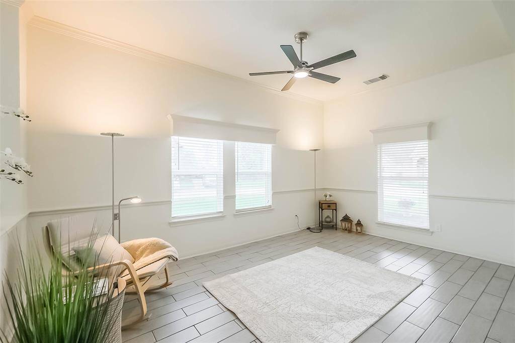 Open the front door to a totally renovated home! This open floor plan home has all new wood-look tile on all the floors. ALL surfaces (walls, doors, cabinets, trim) have been freshly painted.