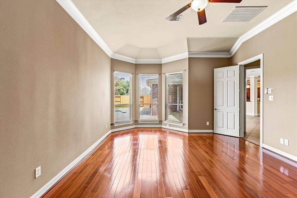 The master bedroom has a gorgeous view of the pool area. The pictures can't show how large it is!