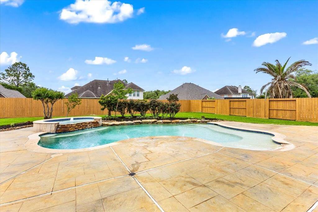 The HUGE deck has plenty of space for pool furnature and fun in the sun.