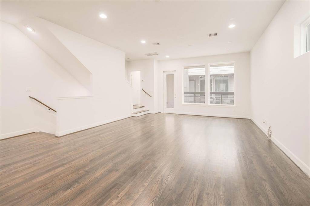 The layout seamlessly connects the living areas, allowing for smooth interaction between spaces. Whether you're hosting guests or spending time with loved ones, the open design makes it easy to move between the kitchen, living room, and dining areas, creating a fluid, welcoming atmosphere for everyday life and entertaining.