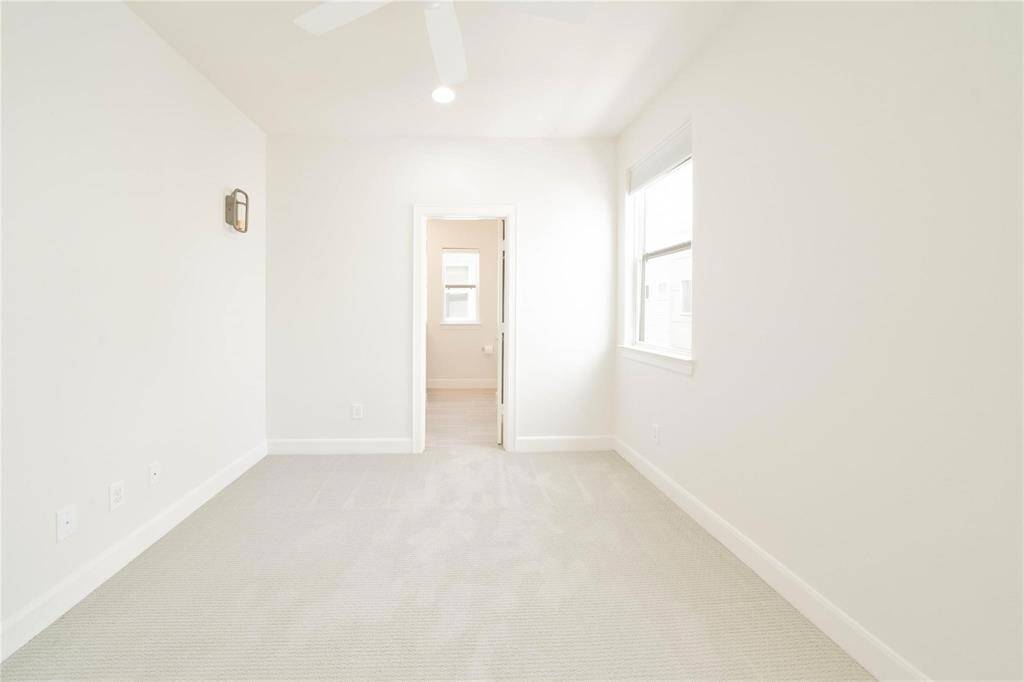 This bright and cozy bedroom is the perfect blank canvas, ready for you to personalize and make it your own. It offers endless possibilities to create a retreat that reflects your style and comfort.