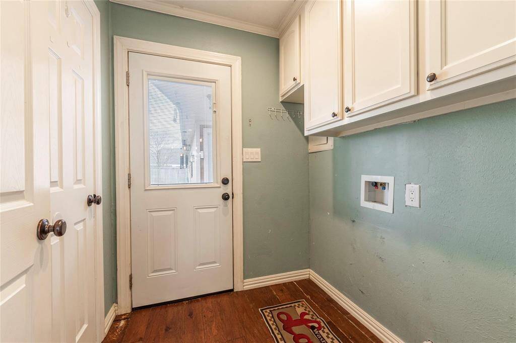 A dedicated in-house utility room provides ample space for laundry and storage, making everyday tasks a breeze.