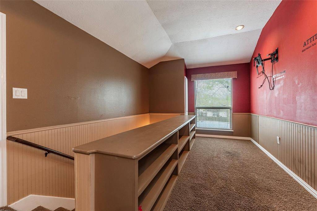 Built in bookshelves make this area perfect reading nook