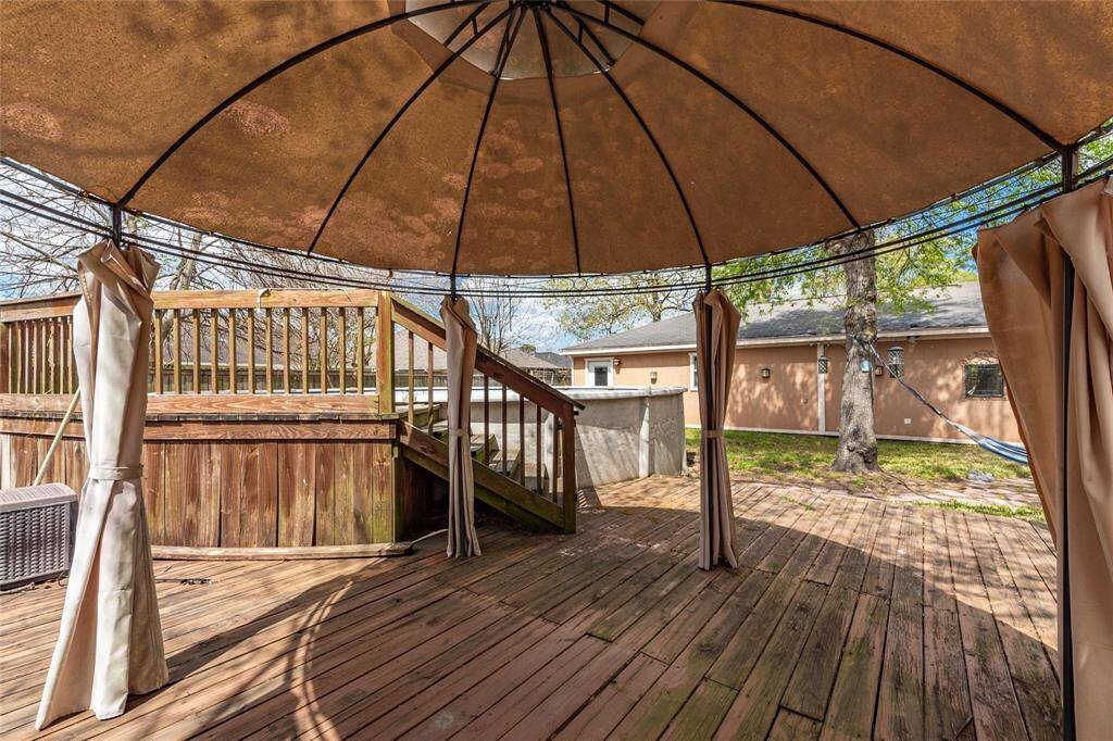 Covered area leading to above ground pool area