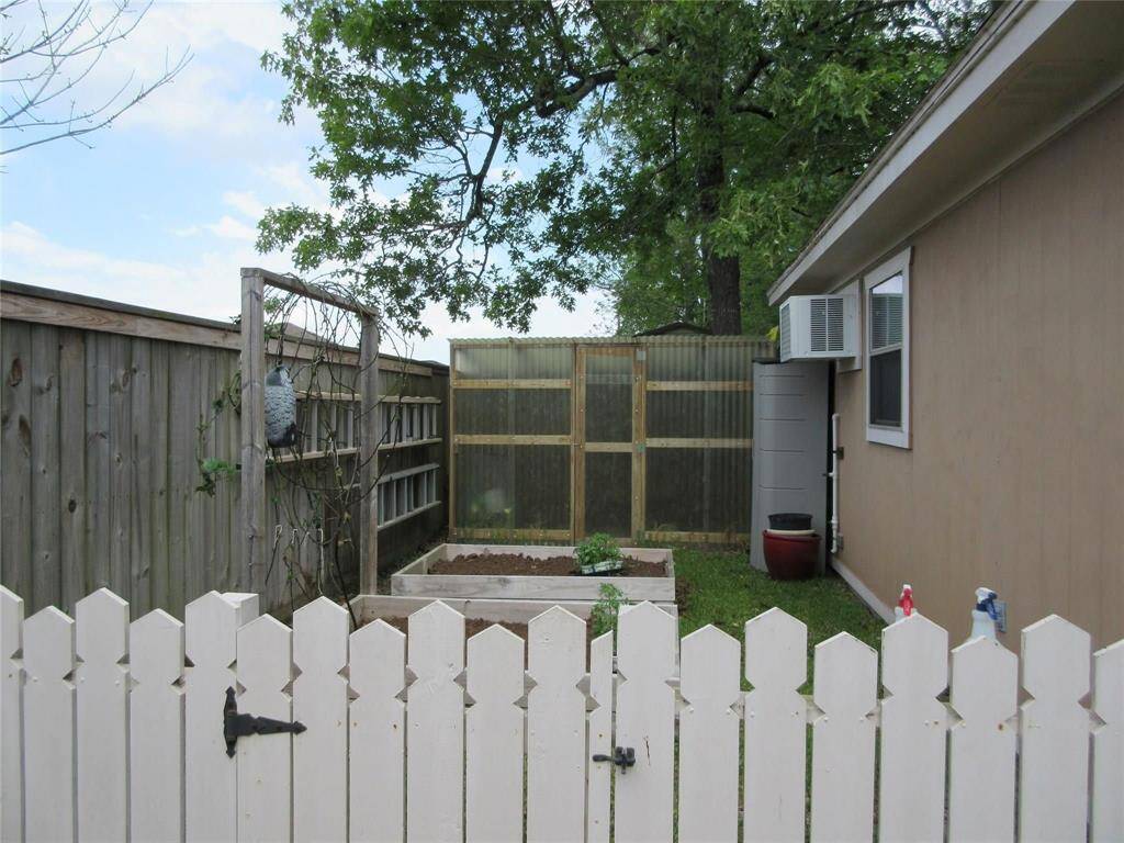 Behind the garage is the dedicated garden area