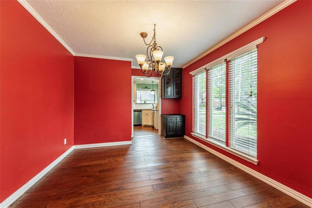 As you enter, you'll find the formal dining room that could also be used as an office or flex space