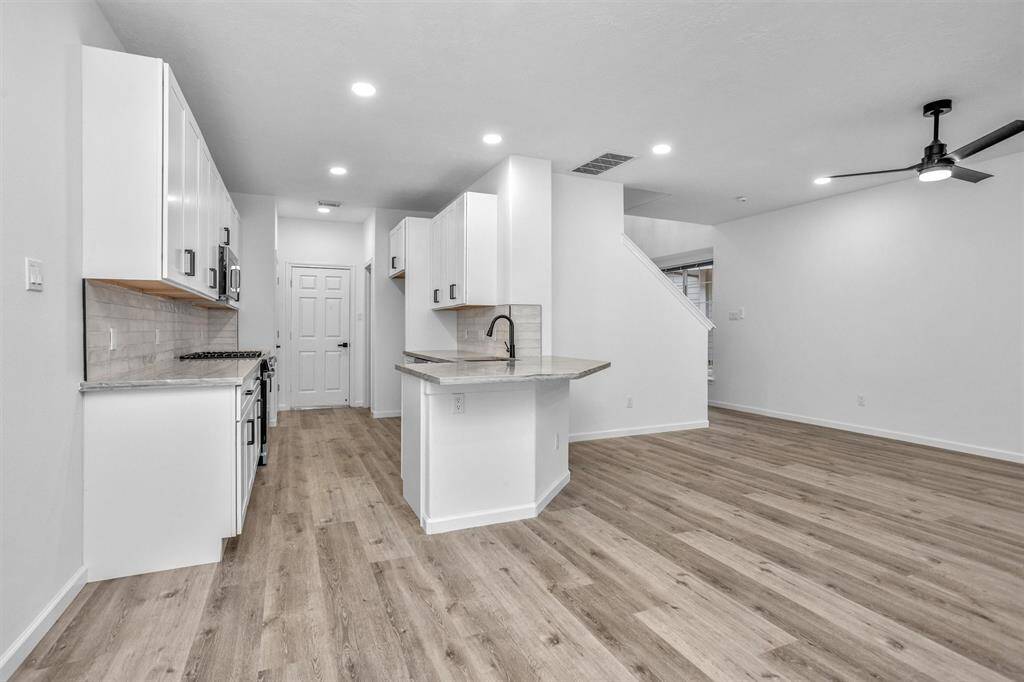 NEW soft close cabinets, granite counter tops, barn sink, appliances, recessed lighting and more!