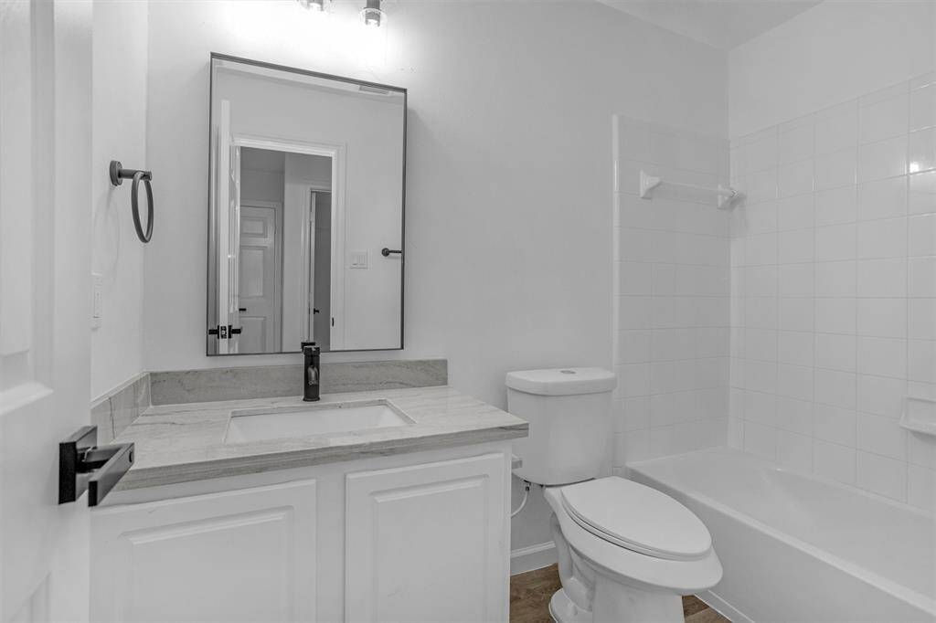 Secondary bath upstairs.