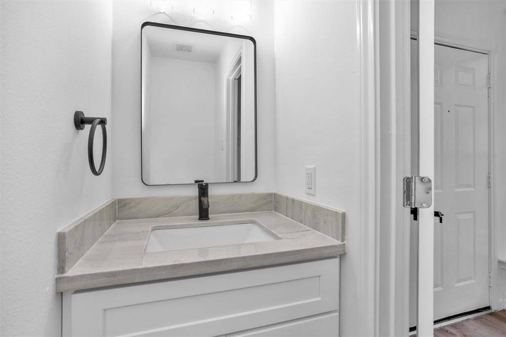 Half bath down just off entry