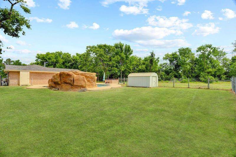 Back Yard View toward Pool and House