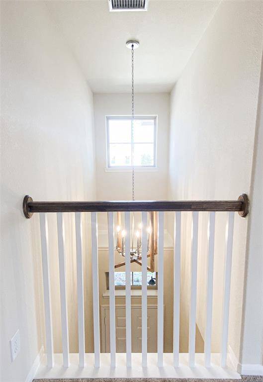 Another view of the two-story entry and the chandelier