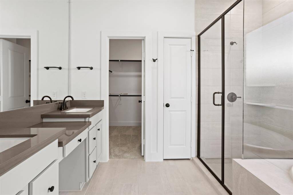 *REPRESENTATIONAL PHOTO* Duel Sinks & A Mud-Set Shower Showcase the Main Bath