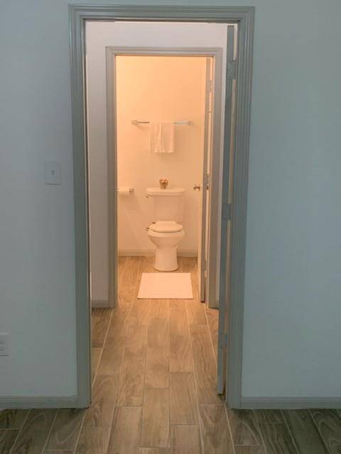 Master bath through walk-in closet