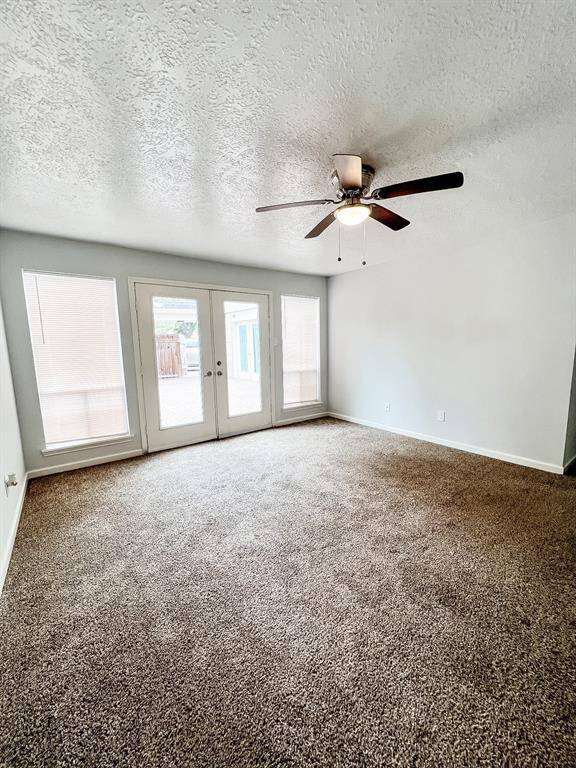 Alternate view of the main bedroom with plenty of natual light.