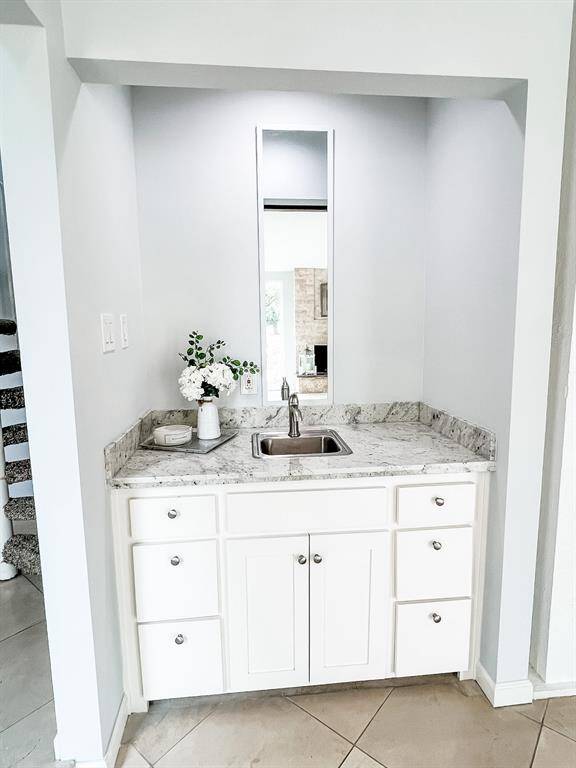 View of the wet bar area located in the living room. This will be perfect for hosting and entertaining!
