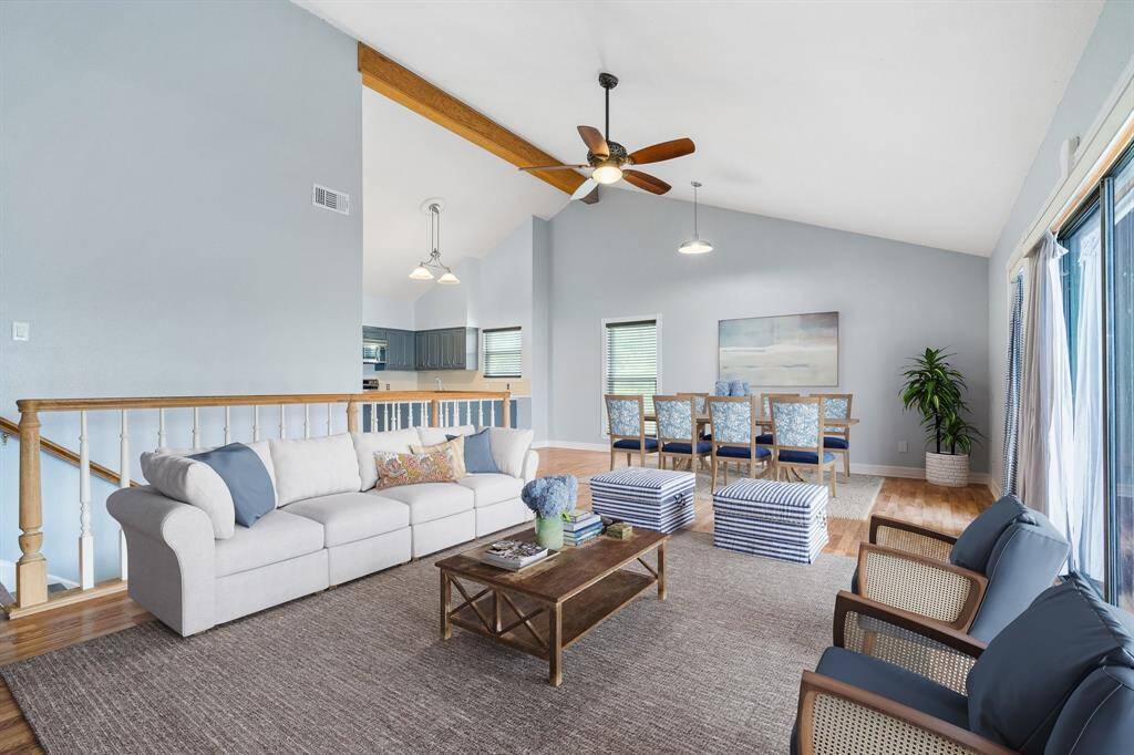 The living spaces are huge with high ceilings combining kitchen, dining and family room as one, all overlooking the pretty, serene lake view of Lake Conroe. VIRTUALLY STAGED