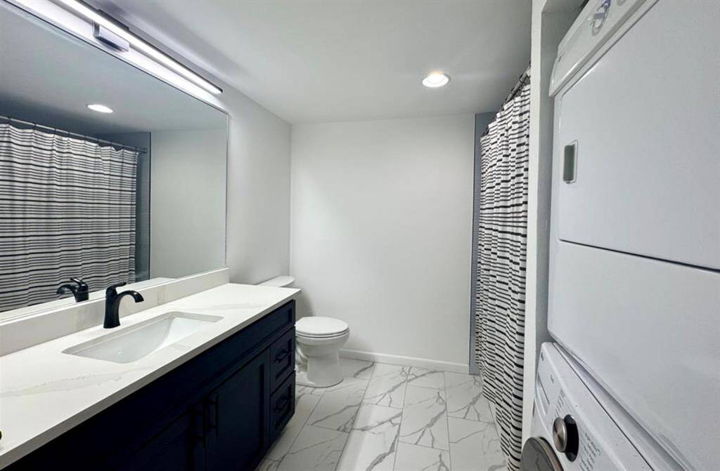 Secondary Bathroom - includes washer dryer