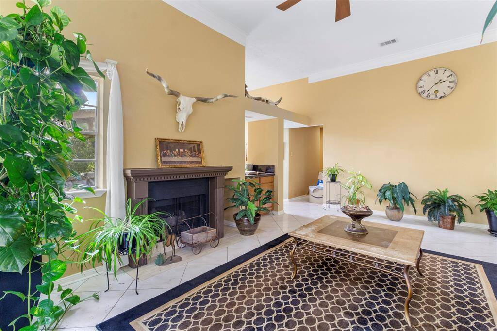 At the heart of the space, a fireplaceadds a cozy focal point, providingwarmth and charm.