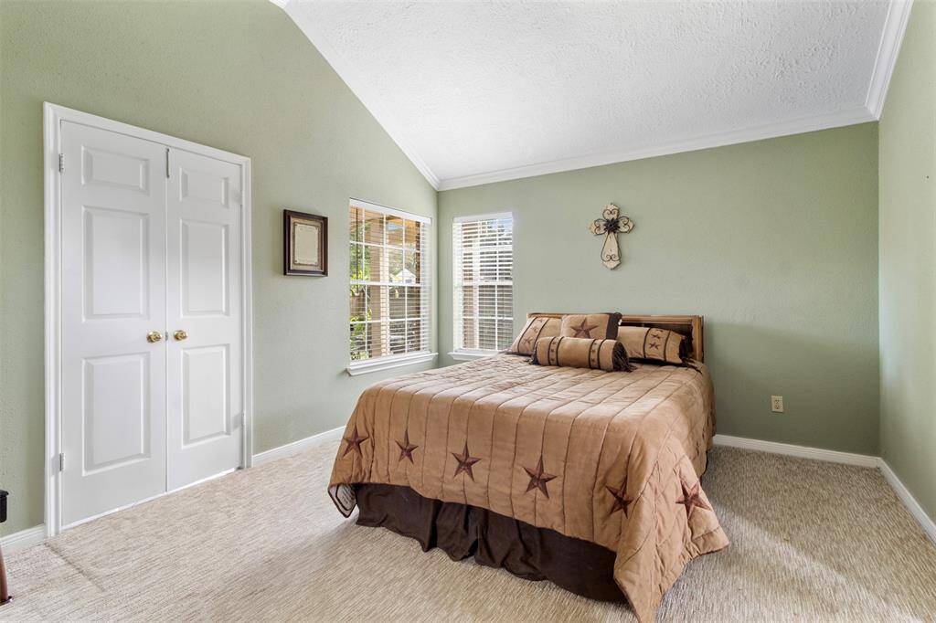 Step into the sanctuary of theprimary bedroom.