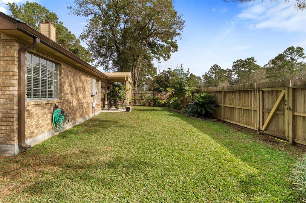 The backyard has plenty of green space!