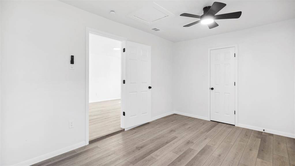 Another view of the primary bedroom