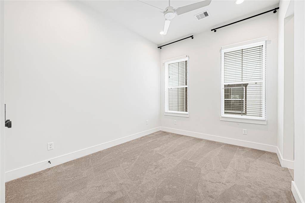 Generously sized secondary bedrooms sharing a convenient Jack-and-Jill bathroom.