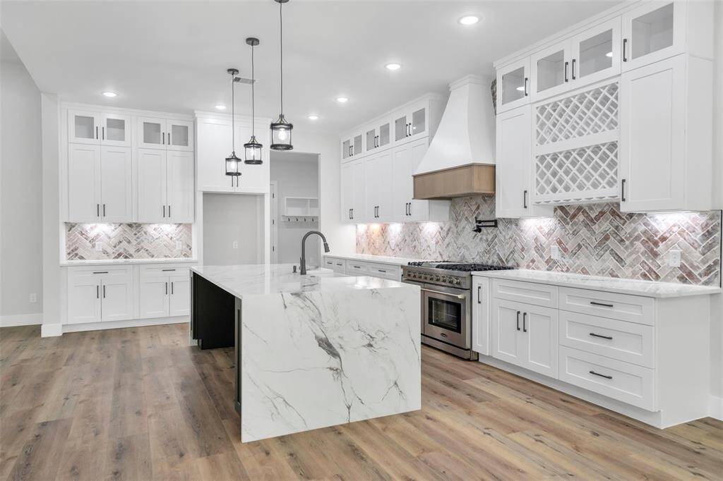 Adjacent to the modern kitchen, you'll find a charming dining room perfect for family meals and entertaining guests