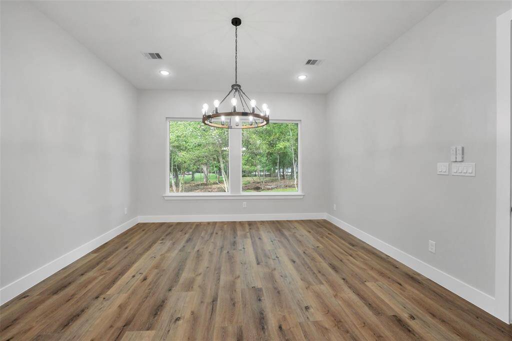 This space is thoughtfully designed to provide a cozy yet sophisticated area for dining, enhancing both everyday living and special occasions