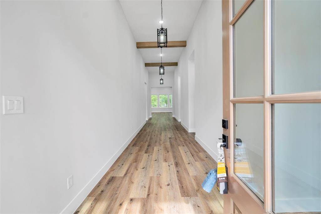 The office is designed to be a versatile space that accommodates both living and working needs