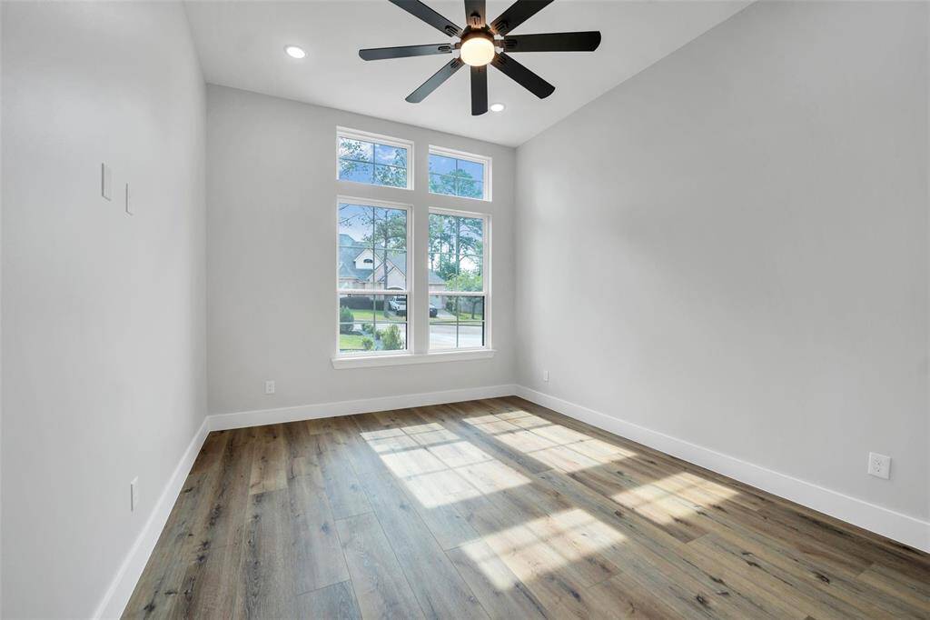 Connected to the secondary primary bedroom is a walk-in closet that provides generous storage space