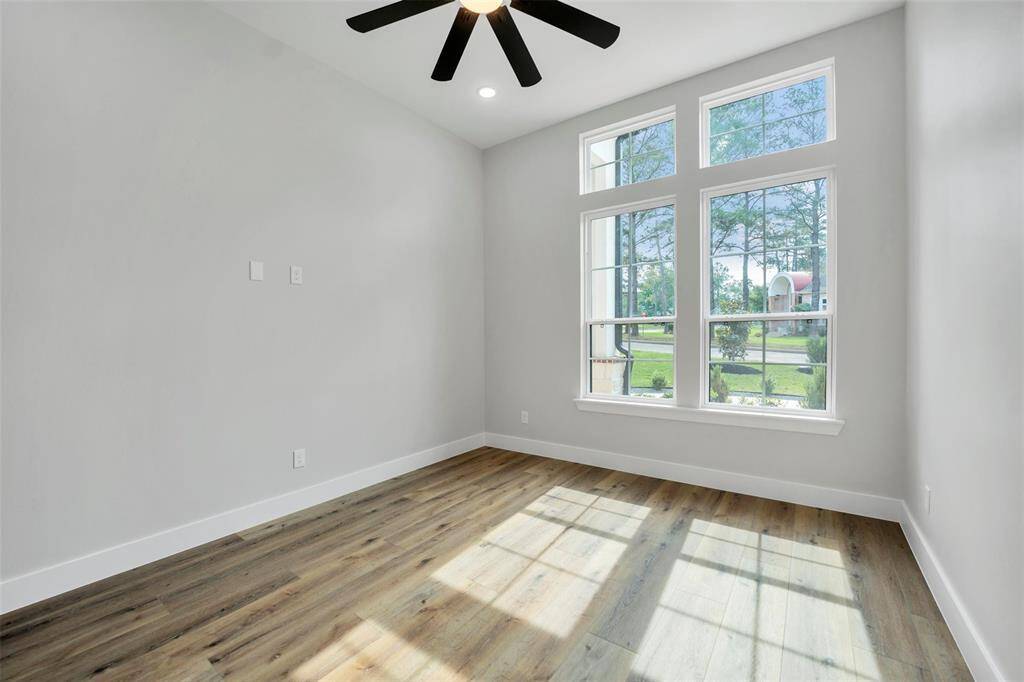 The secondary primary bedroom is a well-appointed bathroom that mirrors the elegance of the primary bathroom
