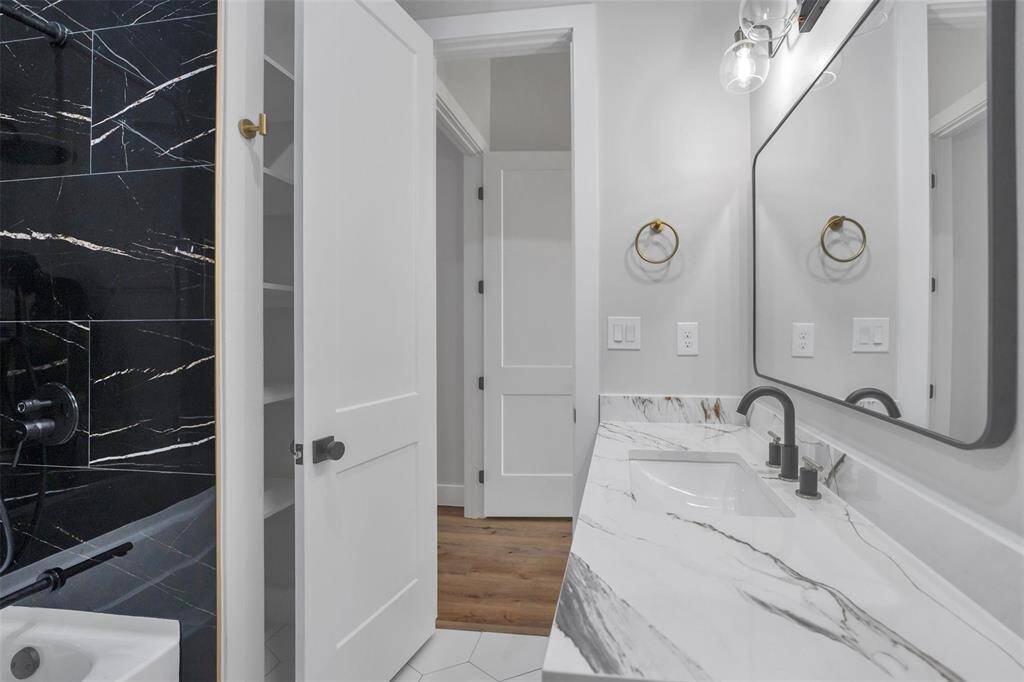 Additionally, there are two more splendid bedrooms that share a convenient Jack-and-Jill bathroom, making it perfect for families or guests