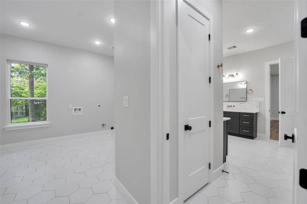 This laundry room is a hub of organization and efficiency, contributing to the overall functionality of a household