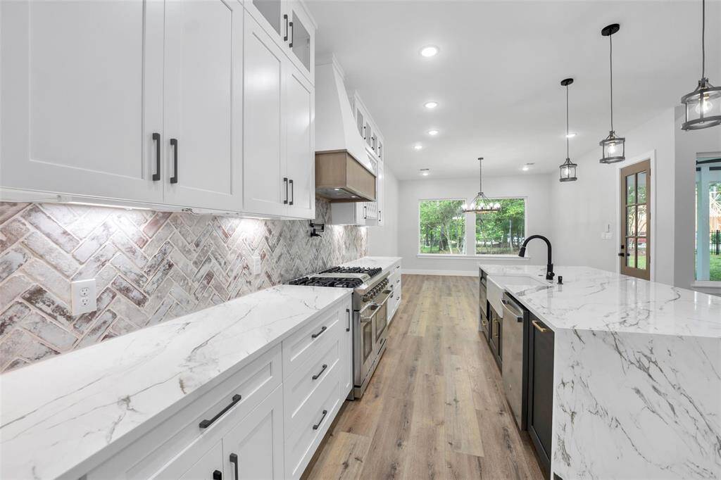 The expansive walk-in pantry provides ample storage, ensuring that all your kitchen essentials are always within easy reach