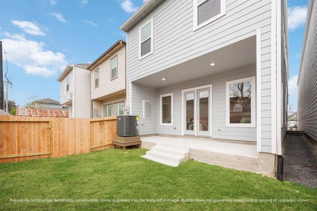 The wide covered patio invites slow mornings, summer dinners, and a little extra breathing room—plus a fenced yard for pets or play.