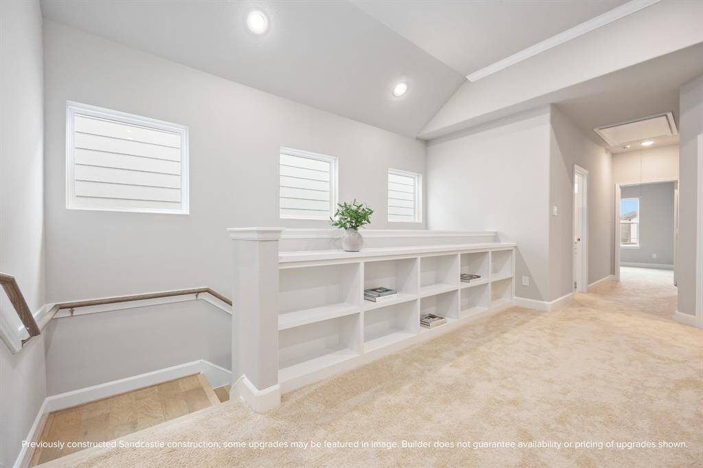 A sun-filled hallway nook makes the perfect reading corner, mini workstation, or stylish display for your favorite finds.